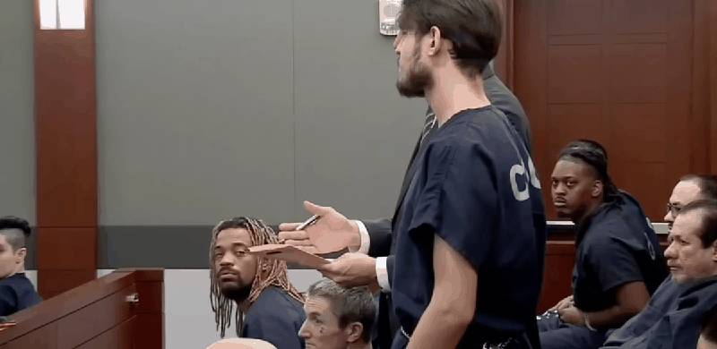 Jose Gutierrez stands in court with his attorney