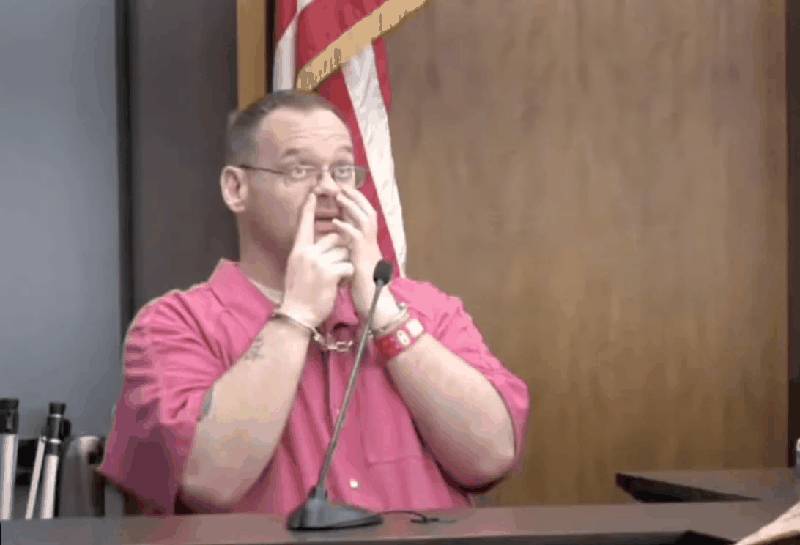 Travis Hodge testifying in handcuffs, emotional moment