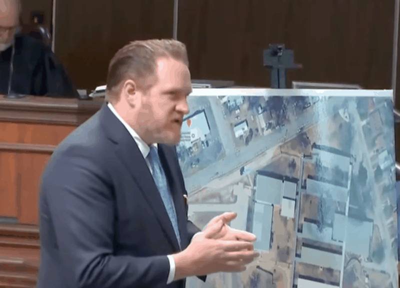 Jason Goss gesturing while explaining timeline