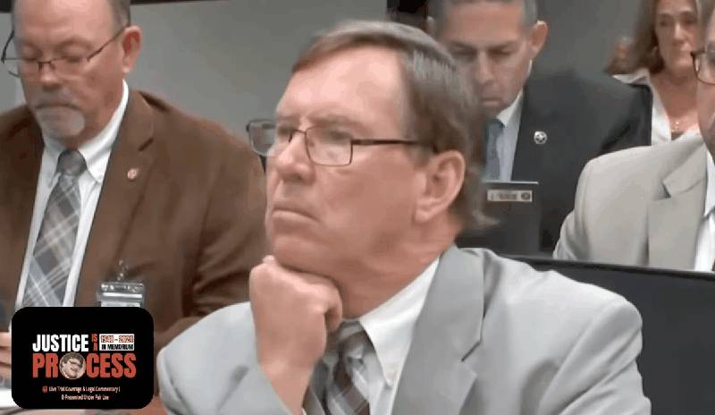 Defense attorney listening to testimony