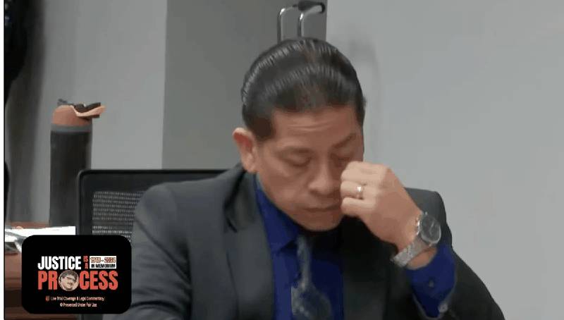 Adrian Gonzales wiping his eye